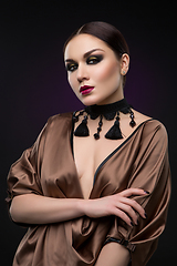 Image showing beautiful young woman with dark makeup