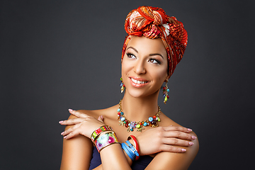 Image showing beautiful mulatto young woman with turban on head