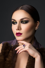 Image showing beautiful young woman with dark makeup