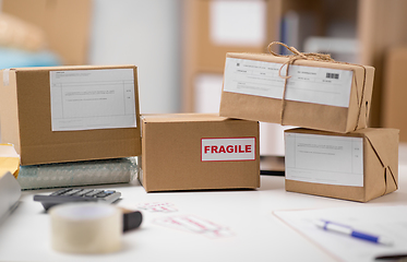 Image showing parcel boxes and packing stuff at post office