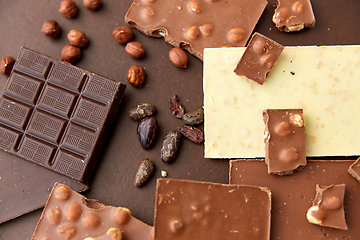 Image showing chocolate bars with hazelnuts and cocoa beans