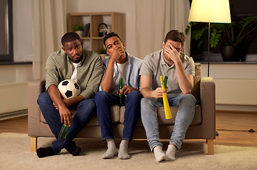 Image showing sad male friends or soccer fans with beer at home