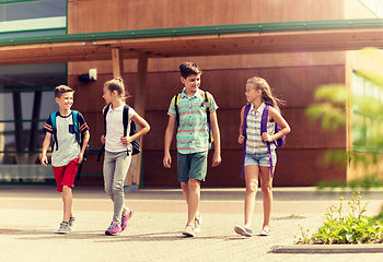 Image showing group of happy elementary school students walking