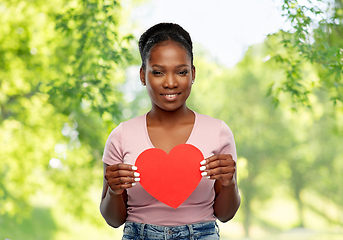 Image showing happy african american woman with red heart