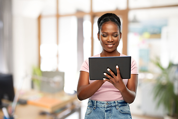 Image showing african american woman with tablet pc at office