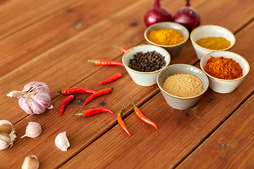 Image showing spices, onion, garlic and red hot chili peppers