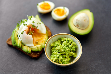 Image showing toast bread with avocado, pouched egg and greens