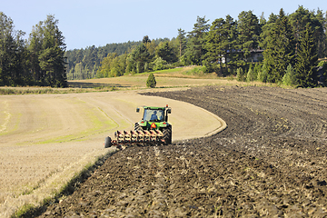 Image showing Tractor and Plough in Field