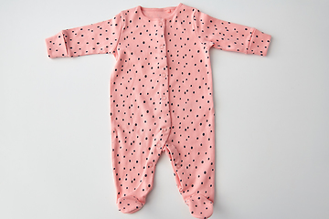 Image showing pink bodysuit for baby girl on white background