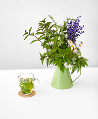 Image showing herbal tea and flowers in jug