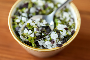 Image showing close up of flavored sea salt in bowl with spoon