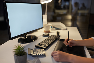 Image showing designer with computer and pen tablet at office