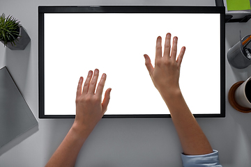 Image showing hands on led light tablet at night office