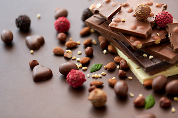 Image showing close up of different chocolates, candies and nuts