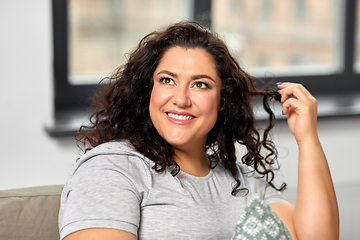 Image showing portrait of happy young woman at home