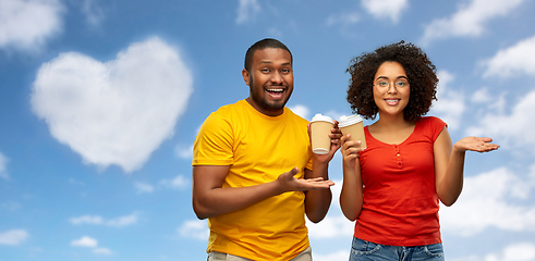 Image showing happy african american couple with coffee cups