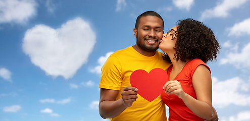 Image showing happy african american couple wit red heart kiss