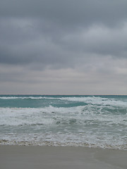 Image showing turquoise tropical ocean and dark sky