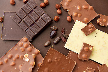 Image showing chocolate bars with hazelnuts and cocoa beans