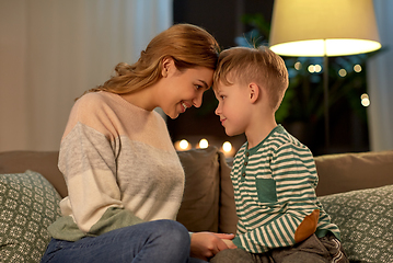 Image showing happy smiling mother and son at home