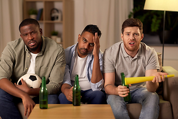 Image showing sad male friends or soccer fans with beer at home