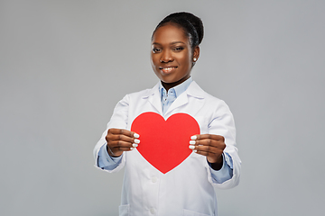 Image showing african american female doctor with red heart