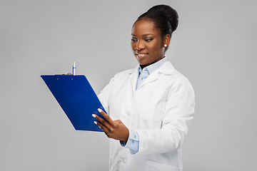 Image showing african american female doctor with clipboard