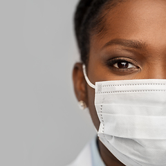 Image showing african american female doctor in facial mask