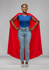 Image showing happy african american woman in red superhero cape