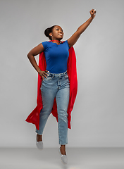 Image showing happy african american woman in red superhero cape