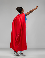 Image showing happy african american woman in red superhero cape