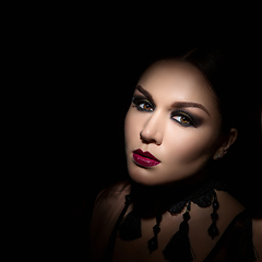 Image showing beautiful young woman with dark makeup