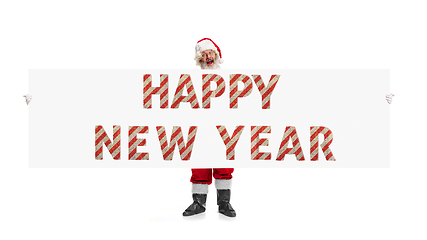 Image showing Santa Claus wishing happy New Year and Merry Christmas