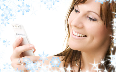 Image showing happy woman with white phone