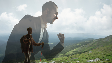 Image showing Silhouette of businessman with landscapes on background, double exposure.