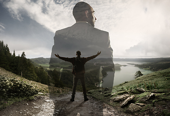 Image showing Silhouette of businessman with landscapes on background, double exposure.