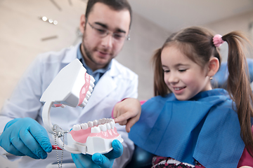 Image showing Young caucasian girl visiting dentist\'s office