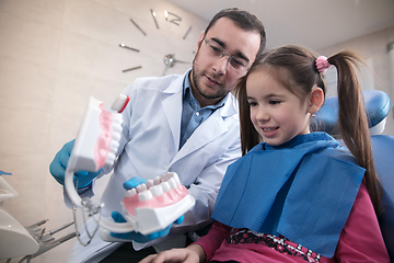 Image showing Young caucasian girl visiting dentist\'s office