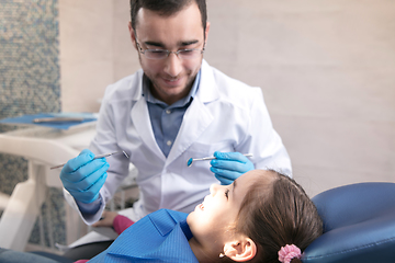 Image showing Young caucasian girl visiting dentist\'s office