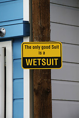 Image showing The only good suit is a wetsuit