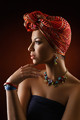 Image showing beautiful mulatto young woman with turban on head