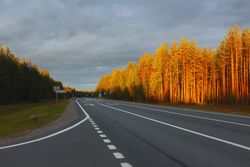 Image showing Empty Highway In The Forest At Sunset