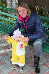 Image showing happy mother playing with her daughter