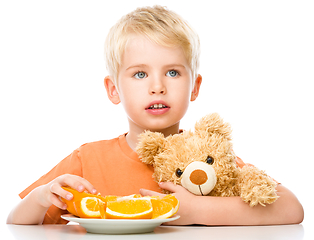 Image showing Portrait of a little boy with his teddy bear