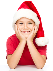 Image showing Portrait of a cute little girl in santa hat