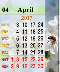 Image showing calendar for April 2017 with bee on the flower