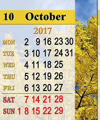 Image showing calendar for October 2017 with yellow leaves