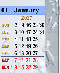 Image showing calendar for January 2017 with traces on the snow