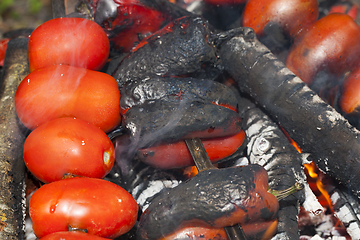 Image showing fried vegetables on a fire