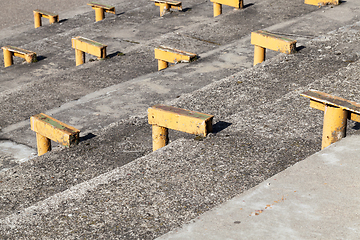 Image showing metal supports for benches